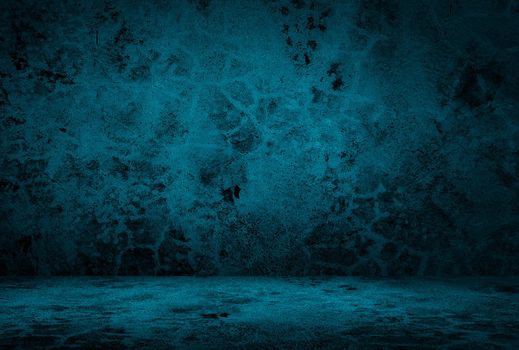 Vintage grunge blue concrete texture studio wall background with vignette