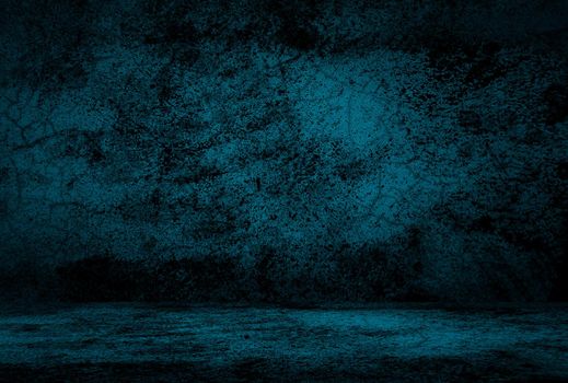 Vintage grunge blue concrete texture studio wall background with vignette