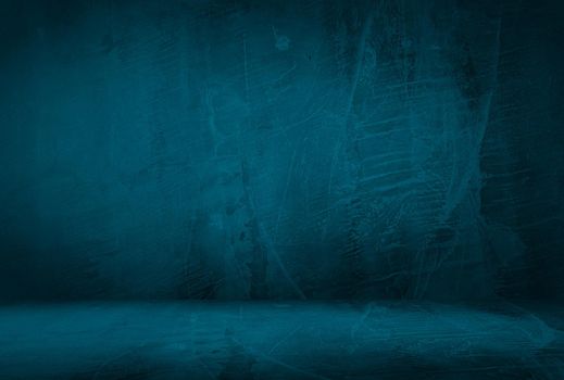 Vintage grunge blue concrete texture studio wall background with vignette