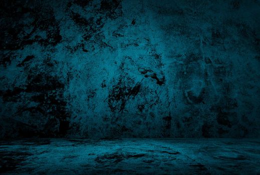 Vintage grunge blue concrete texture studio wall background with vignette