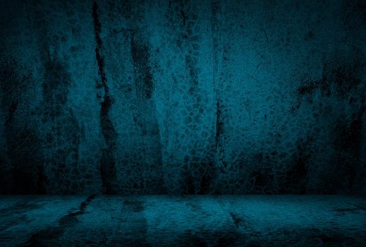 Vintage grunge blue concrete texture studio wall background with vignette