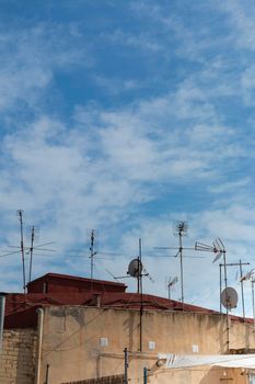 Rooftops with antennas in the countryside of a village in Andalusia in southern Spain