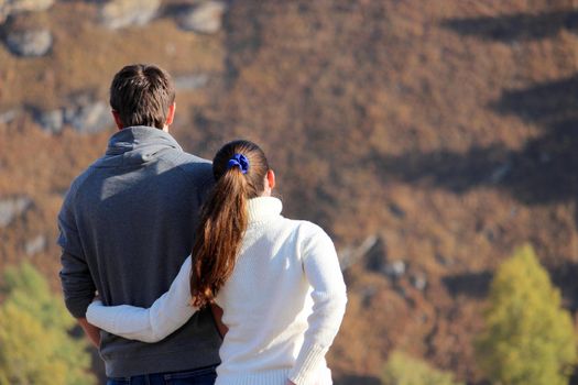 Romantic relationships. Beautiful nature. Two young people admire nature. High quality photo