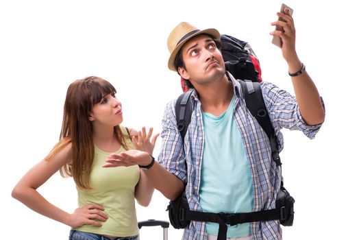 Young family preparing for vacation travel on white