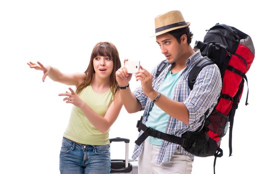 Young family preparing for vacation travel on white