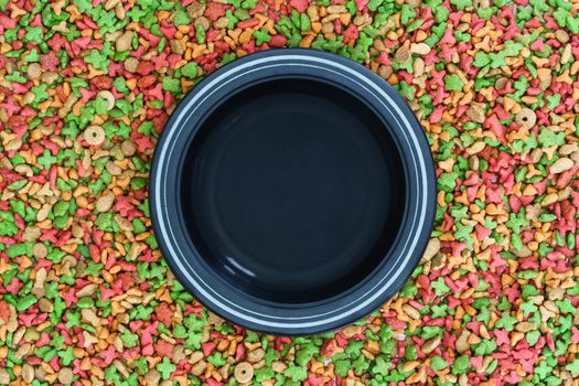 Top view dry food for cat and dog with empty bowl