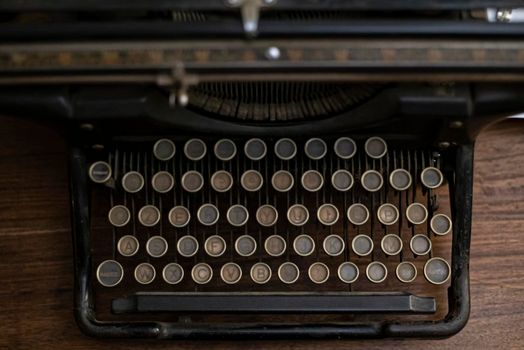 Close up detail of a Ancient typewriter in low light