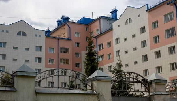 Exterior view, facade of a beautiful multi-storey building.