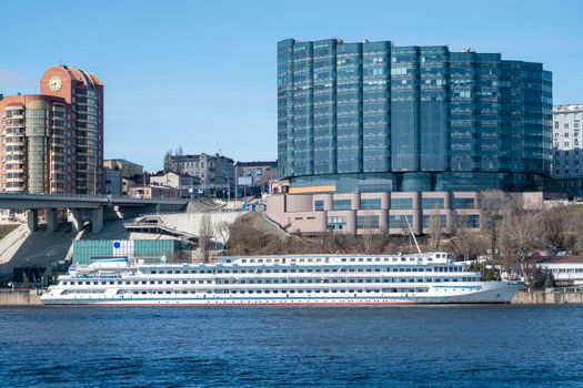 pleasure passenger ship on the background of the city. High quality photo