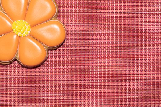 ginger cookies in the form of a flower on a red background. High quality photo