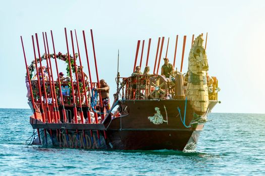 Boat in the form of galleys on black sea