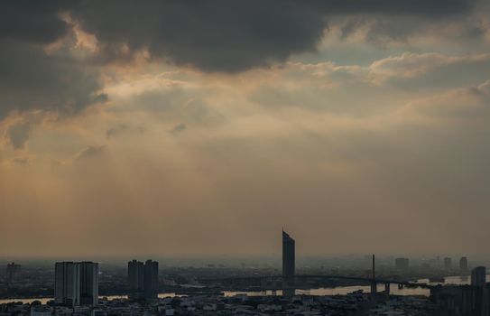 Bangkok, Thailand - Dec 28, 2020 : Aerial view of Beautiful scenery view of Skyscraper Evening time before Sunset creates relaxing feeling for the rest of the day. Selective focus.