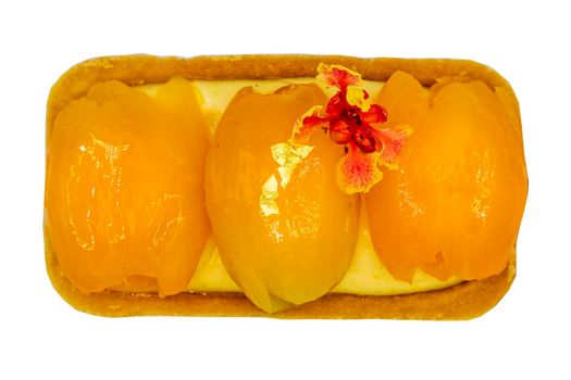Traditional French sweet dessert : Mayomgchid fruit isolated on white background with clipping path. Mayomgchid tart is on a golden cardboard cake base. Top view, Selective focus.