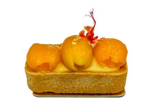 Traditional French sweet dessert : Mayomgchid fruit isolated on white background with clipping path. Mayomgchid tart is on a golden cardboard cake base. Selective focus.