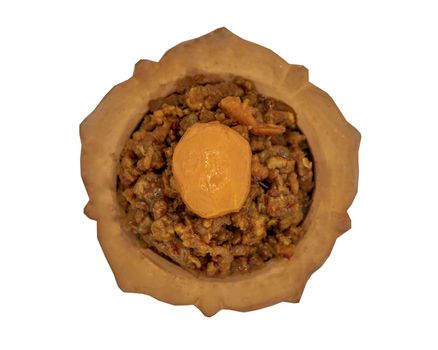Thai style food : Stir-Fried Pork Crackle with Curry Paste (Fried ginger pork with salted duck egg) isolated on white background with clipping path. Top view, Selective focus.