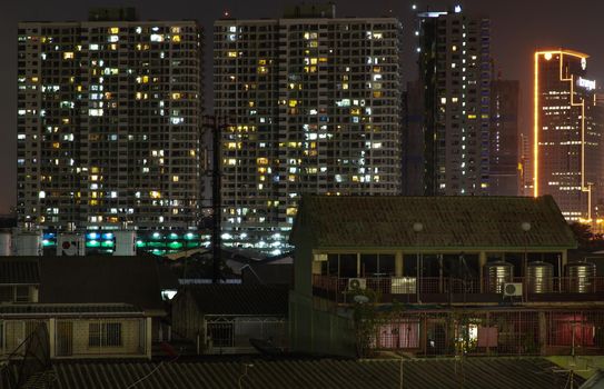 Bangkok, Thailand - 05 Apr 2020 : House and Building in Bangkok downtown at night. No focus, specifically.