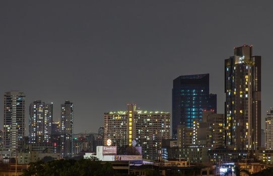 Bangkok, Thailand - 05 Apr 2020 : Bangkok downtown at night view in the business district, Beautiful twilight give the city a modern style, Selective focus.