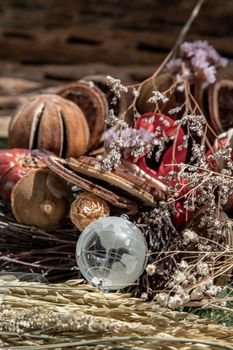 The freshness of Glass crystal globe in the middle of dried flowers. World Environment and Ecology concept, nature background.