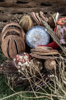 The freshness of Flower in Crystal glass in the middle of Dried flowers. World Environment and Ecology concept, Nature background.