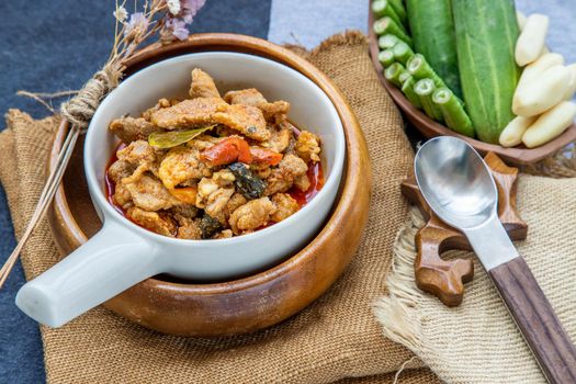Thai style food : Panaeng Curry with Pork menu with Coconut milk (Dried red pork coconut curry) Served with vegetable. Delicious and famous Thailand food.