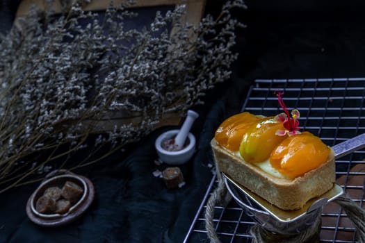 Traditional French sweet dessert : Mayomgchid tart on beautiful background. One piece, Delicious seasonal breakfast, Selective focus.