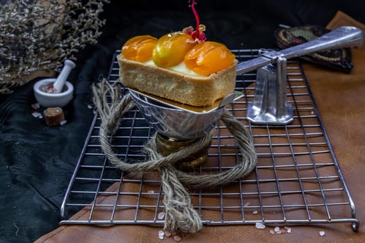 Traditional French sweet dessert : Mayomgchid tart on beautiful background. One piece, Delicious seasonal breakfast, Selective focus.