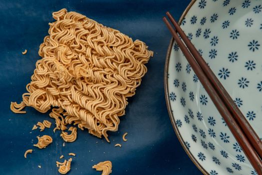 Easy food, Dried instant noodles and hot water in a bowl.