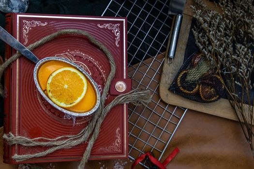 Traditional French sweet dessert : Orange cheese cake on beautiful background. One piece, Delicious seasonal breakfast. Top view, Selective focus.
