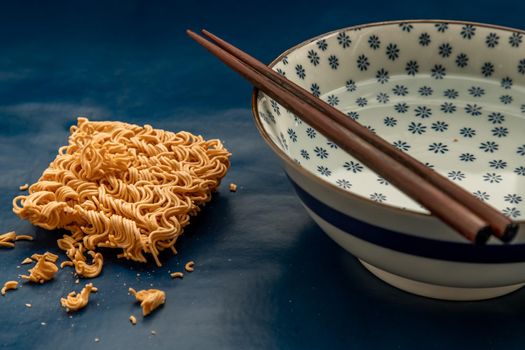 Easy food, Dried instant noodles and hot water in a bowl.