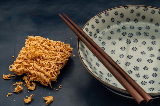 Easy food, Dried instant noodles and hot water in a bowl.