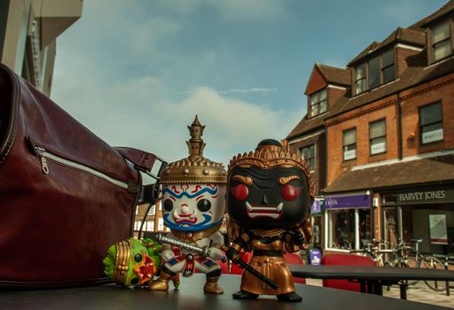 London, England - Jan 13, 2019 : Ravana, Giantess and Hanuman Happy traveller visiting in England. Traveller doll.