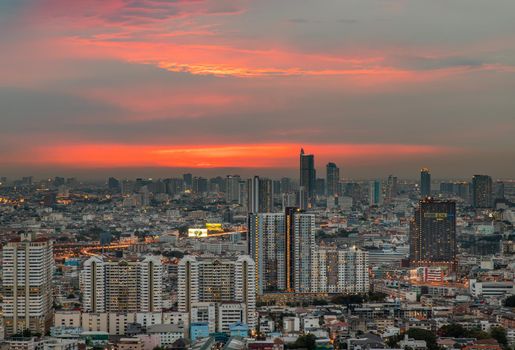 Bangkok, thailand - May 11, 2020 : Sky view of Bangkok with skyscrapers in the business district in Bangkok in the evening beautiful twilight give the city a modern style. Selective focus.