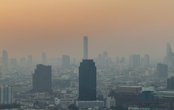 Bangkok, Thailand - Jan 13, 2021 : Aerial view of Beautiful scenery view of Skyscraper Evening time before Sunset creates relaxing feeling for the rest of the day. Selective focus.