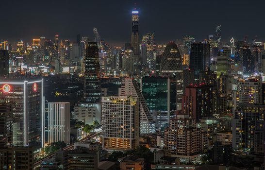 Bangkok, thailand - Aug 28, 2020 : Bangkok downtown cityscape with skyscrapers at night give the city a modern style. Selective focus.