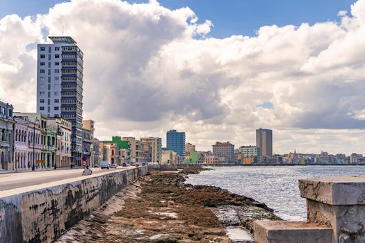 Havana Cuba. November 25, 2020: Panoramic of the Malecon of Havana, coastline with its buildings, the avenue of the malecon and the sea. One of the most famous places in Havana.