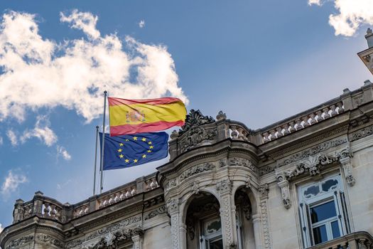 Havana Cuba. November 25, 2020: Flags of Spain and the European waving over the Embassy of Spain in Cuba.