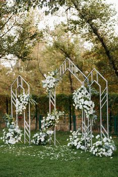 wedding ceremony area with dried flowers in a meadow in a pine brown forest