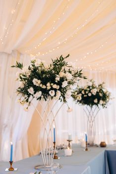 elegant wedding decorations made of natural flowers and green elements