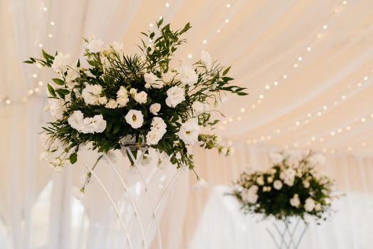 elegant wedding decorations made of natural flowers and green elements