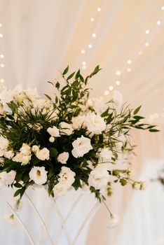 elegant wedding decorations made of natural flowers and green elements