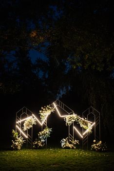 wedding ceremony area with dried flowers in a meadow in a pine brown forest