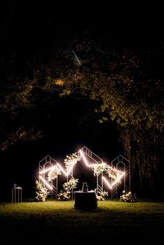 wedding ceremony area with dried flowers in a meadow in a pine brown forest