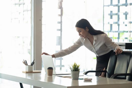 Young asian woman working laptop for business or online learning