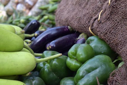 A view of assorted vegetables displayed in a market place