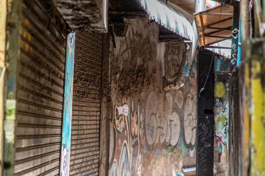 Bangkok, Thailand - Jun 19, 2020 : The closed shop in Alley at Khao San Road on daytime without people. COVID-19 outbreak situation