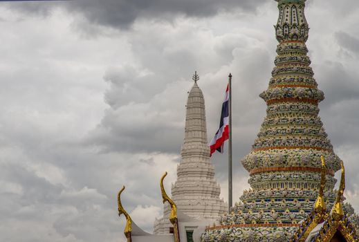 Bangkok, Thailand - Jun 19, 2020 : Beautiful Thai architecture of buildings in The Temple of the Emerald Buddha, the most sacred Buddhist temple in Thailand, it is also a potent religion symbolic of Thailand.