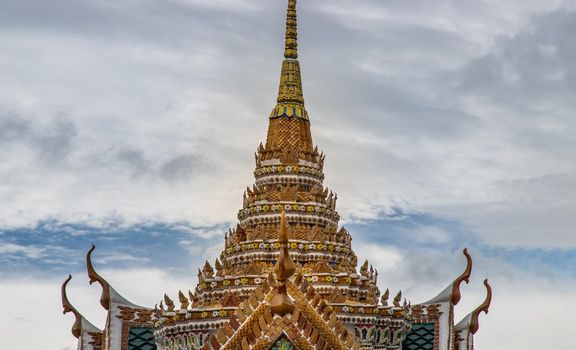 Bangkok, Thailand - Jun 19, 2020 : Beautiful Thai architecture of buildings in The Temple of the Emerald Buddha, the most sacred Buddhist temple in Thailand, it is also a potent religion symbolic of Thailand.