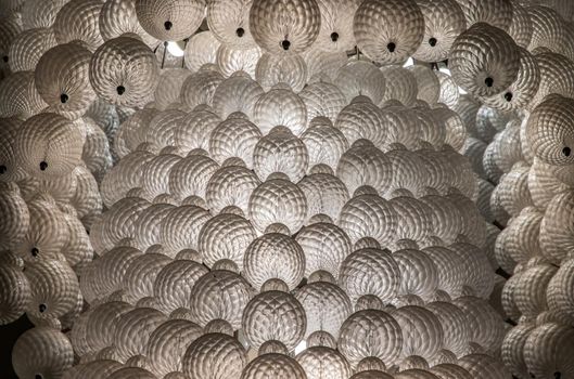 Close-up shot of White gorgeous vintage chandelier decoration.