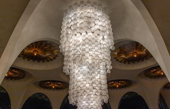 Bangkok, Thailand, Jul 03, 2020 : Beautiful interior design with Vintage chandelier lamps in Scala cinema theater at Siam Square in the night. Cultural entertainment.