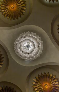 Bottom view of BWhite gorgeous vintage chandelier decoration at Siam Square. Cultural entertainment.